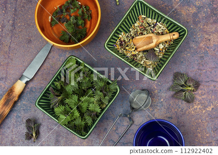 Herbal tea with raw nettle, homeopathic herbs. Herbal tea with raw nettle, homeopathic herbs. 112922402