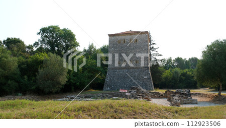 Ruins of Great Basilica in Butrint National Park, Buthrotum, Albania. Triconch Palace at Butrint Life and death of an ancient Roman house Historical medieval Venetian Tower surrounded. High quality Ruins of Great Basilica in Butrint National Park, Buthrotum, Albania. Triconch Palace at Butrint Life and death of an ancient Roman house Historical medieval Venetian Tower surrounded. High quality 112923506