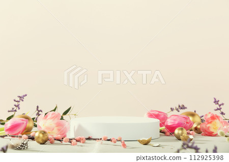 Empty round podium, easter gold eggs with spring flowers on a yellow background Empty round podium, easter gold eggs with spring flowers on a yellow background 112925398
