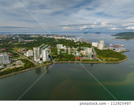 Aerial view of panorama of Kota Kinabalu city with modern buildings. Borneo,Sabah, Malaysia. 112925497