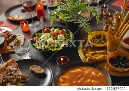 Brunch table setting with tasty delicious food and beverages ready for holiday home dinner 112927021