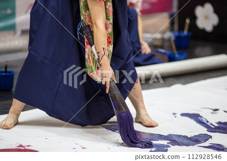 A woman in a hakama A woman in a hakama 112928546