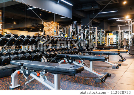 Interior view of an unmanned fitness gym 112928733