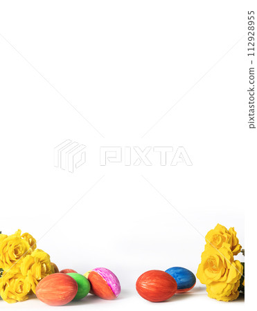 Easter eggs and yellow roses on white background with copy space for text. Easter eggs and yellow roses on white background with copy space for text. 112928955
