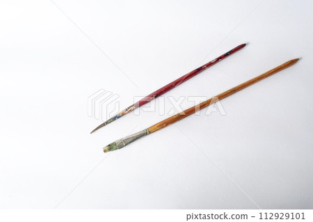 Paint brushes isolated on white background. Art supplies. 112929101