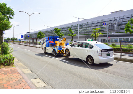 Taxi being towed Taxi being towed 112930394
