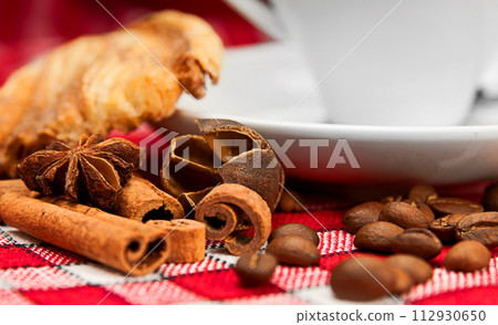 bun, coffee and cinnamon 112930650