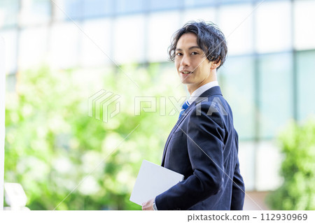 Businessman outside male Businessman outside male 112930969