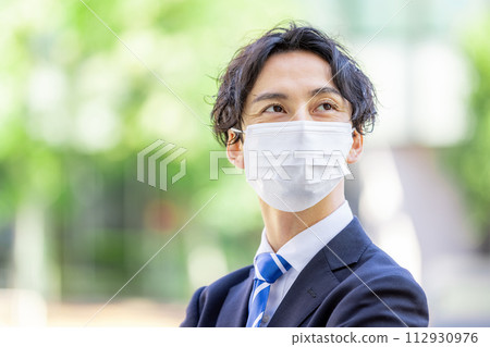 Businessman mask suit outdoors Businessman mask suit outdoors 112930976