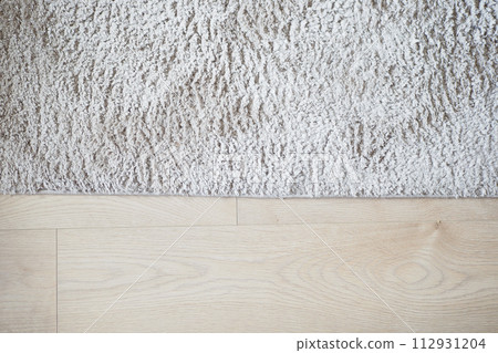 carpet texture background on wooden floor with copy space carpet texture background on wooden floor with copy space 112931204
