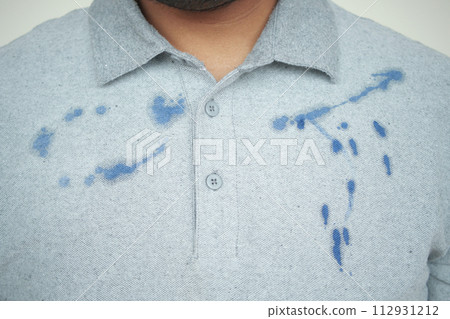 shirt with blue ink stain . 112931212