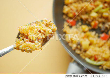 bulgur rice on a spoon bulgur rice on a spoon 112931360