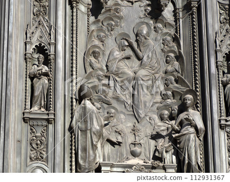 Florence Cathedral Santa Maria dei Fiori Italy - detail of sculpture of door Florence Cathedral Santa Maria dei Fiori Italy - detail of sculpture of door 112931367