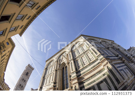 fisheye unusual view Cathedral Santa Maria dei Fiori, Brunelleschi Dome and Giotto Tower in Florence Italy fisheye unusual view Cathedral Santa Maria dei Fiori, Brunelleschi Dome and Giotto Tower in Florence Italy 112931373