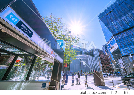 Japan's Tokyo cityscape A light of hope... towards tomorrow. A view of the Ginza Station entrance and exit and Sukiyabashi intersection after the coronavirus outbreak = 16th 112931633