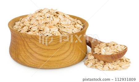 Oat flakes in wooden bowl and spoon isolated on white background with full depth of field 112931809