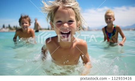 Three happy children are swimming in the sea Three happy children are swimming in the sea 112933416