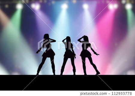 Three female idols on stage and colorful spotlights 112933778