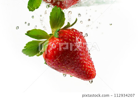 strawberry and water splash 112934207