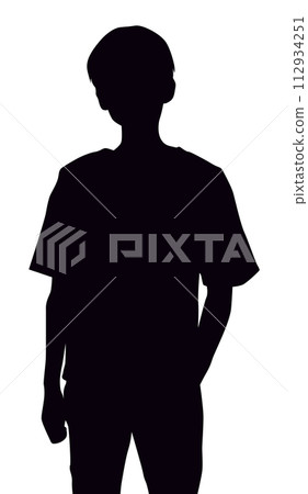 Silhouette of a teenage boy with his hands in his pockets 112934251