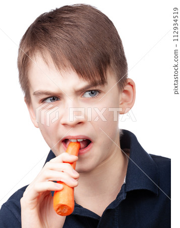 Boy Dislikes Eating Carrot Boy Dislikes Eating Carrot 112934519