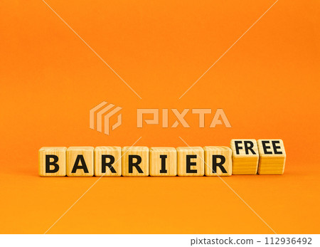Barrier free symbol. Concept words Barrier free on beautiful wooden cubes. Beautiful orange table orange background. Business, inclusivity and barrier free concept. Copy space. 112936492