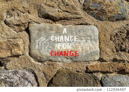 A chance for change symbol. Concept words A chance for change on beautiful big grey stone. Beautiful stone wall background. Business A chance for change concept. Copy space. 112936497