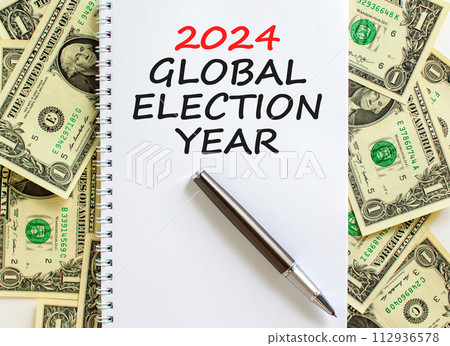 2024 global election year symbol. Concept words 2024 global election year on beautiful note. Beautiful dollar bills background. Dollar bills. Business 2024 global election year concept. Copy space 2024 global election year symbol. Concept words 2024 global election year on beautiful note. Beautiful dollar bills background. Dollar bills. Business 2024 global election year concept. Copy space 112936578