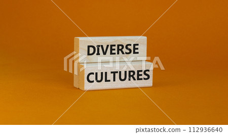 Time to diverse cultures symbol. Wooden blocks with words 'Diverse cultures'. Beautiful orange background. Business and diverse cultures concept. Copy space. 112936640