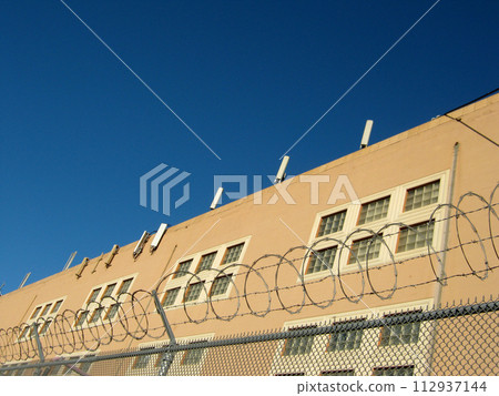 Cell Towers line top of Building 112937144