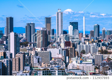 Tokyo cityscape in Japan Ikebukuro subcenter. View of Sunshine 60 and tower apartments = March 10th 112937893
