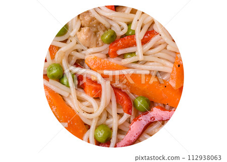 Delicious rice noodles or udon with chicken, carrots, pepper, salt, spices and herbs Delicious rice noodles or udon with chicken, carrots, pepper, salt, spices and herbs 112938063