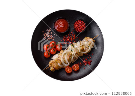 Delicious fresh chicken meat kebab with salt, spices and herbs Delicious fresh chicken meat kebab with salt, spices and herbs 112938065