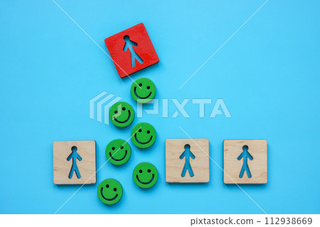 Positivity concept. Smileys and a figure rising above others. Positivity concept. Smileys and a figure rising above others. 112938669