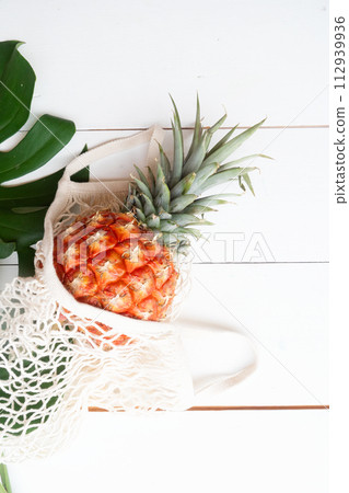 pinapple on white wooden table 112939936