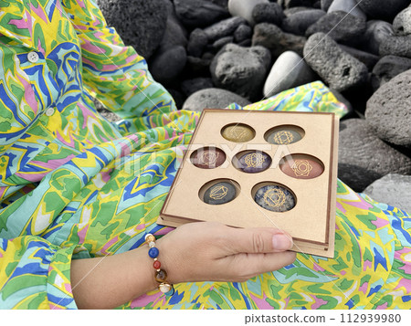 Healing crystals on brown background 112939980