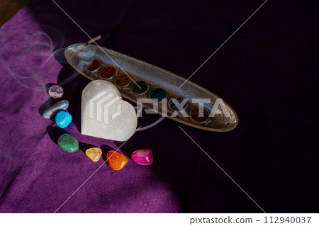 seven chakras stones, energy healing concept 112940037