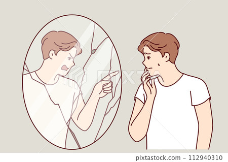 Man suffering from hallucinations and mental disorder looks in mirror with evil reflection 112940310