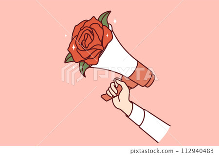 Megaphone with flowers in hands of man, metaphor for peaceful protest and call for pacifism 112940483