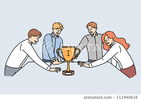 Team of business people fight for golden cup, standing around table and holding out hands to trophy 112940616