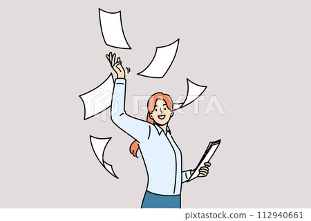 Woman office clerk throws documents up, rejoicing of digitalization and reduction of paperwork 112940661