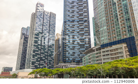 Downtown skyscrapers office buildings of modern megalopolis timelapse hyperlapse Downtown skyscrapers office buildings of modern megalopolis timelapse hyperlapse 112940806