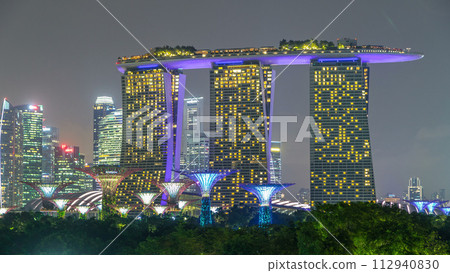 Marina Bay Sands, Gardens by the bay with cloud forest, flower dome and supertrees night timelapse hyperlapse 112940830