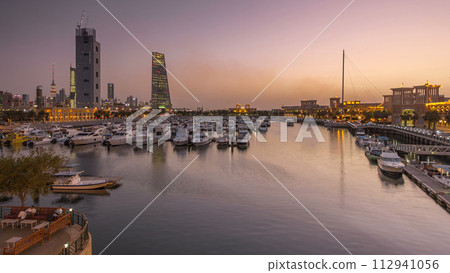 Yachts and boats at the Sharq Marina day to night timelapse hyperlapse in Kuwait. Kuwait City, Middle East Yachts and boats at the Sharq Marina day to night timelapse hyperlapse in Kuwait. Kuwait City, Middle East 112941056