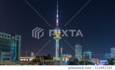 The Liberation Tower timelapse hyperlapse in Kuwait City illuminated at night. Kuwait, Middle East The Liberation Tower timelapse hyperlapse in Kuwait City illuminated at night. Kuwait, Middle East 112941103