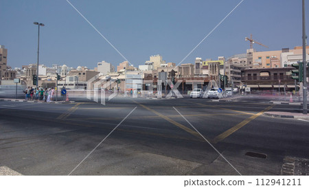 Intersection at entrance of the Dubai Old Souq in Dubai timelapse 112941211