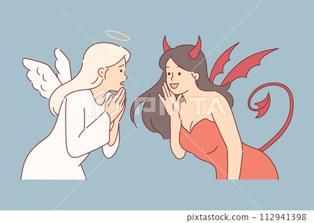 Women dressed as angel and devil for halloween party, discussing latest news together Women dressed as angel and devil for halloween party, discussing latest news together 112941398