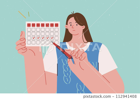 Calendar showing menstrual cycle in hands woman declaring importance of uterine and ovarian health Calendar showing menstrual cycle in hands woman declaring importance of uterine and ovarian health 112941408
