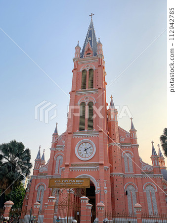 pink church illuminated by the setting sun 112942785