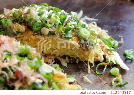 Hiroshima okonomiyaki (meatball soba with green onions) 112943517